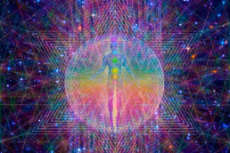 image of person showing the chakras in color within the universe