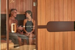couple in Elixir's infrared sauna after couples massage