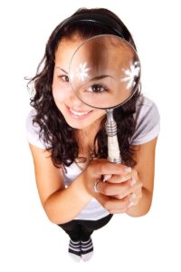 woman with magnifying glass