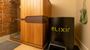 Elixir Mind Body Massage treatment room with the cold plunge and the infrared sauna