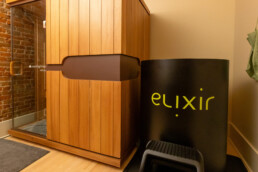 Elixir Mind Body Massage treatment room with the cold plunge and the infrared sauna