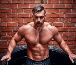 Athlete lowering himself into Elixir's cold plunge tub